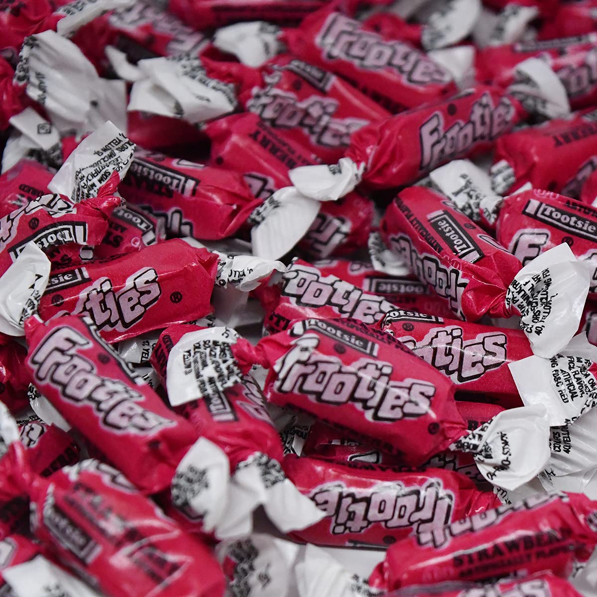 Tootsie Roll Strawberry Frooties arranged for a festive party table.