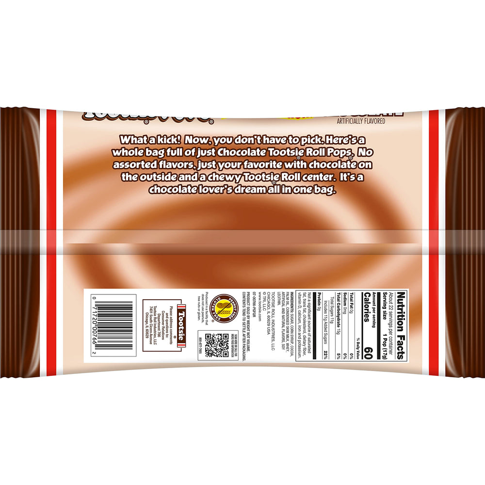 Close-up of chocolate shell and chewy center of Tootsie Pops