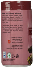 TOP BRIGHT Tea Masala bottle in kitchen with steam rising