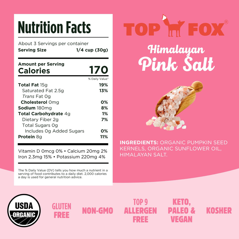 Top Fox Snacks Himalayan salt pumpkin seeds close-up showing salt grains and crunchy surface.