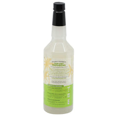 Top Hat Provisions 32oz margarita mix close-up highlighting natural lime and orange flavors.