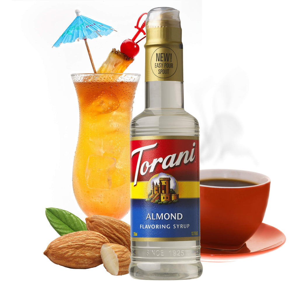 Kitchen counter with Torani Almond Syrup and glassware ready for crafting drinks