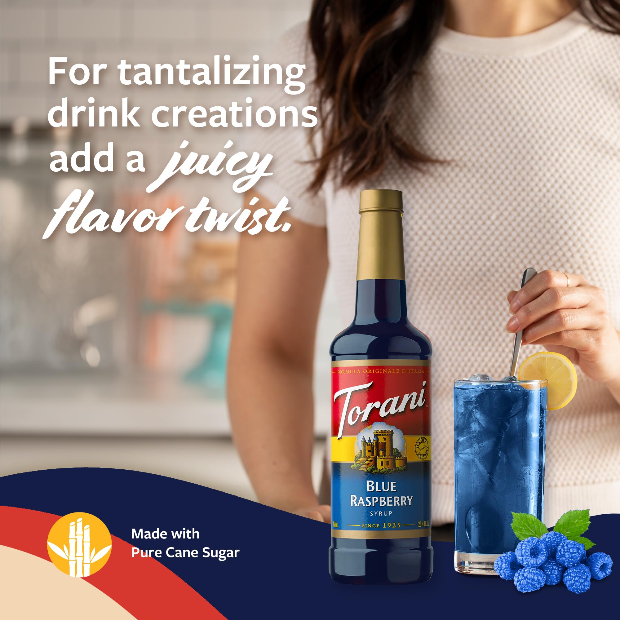 Pouring Torani Blue Raspberry into a glass to color a drink