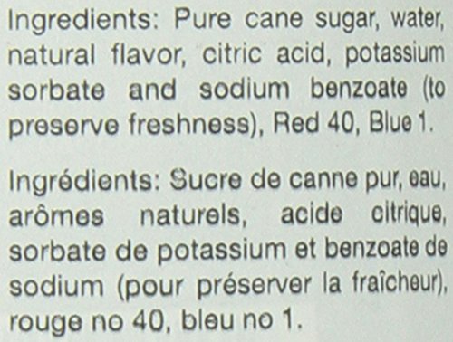 Close-up of Torani Blueberry Syrup beside pancakes for topping.