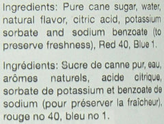Close-up of Torani Blueberry Syrup beside pancakes for topping.