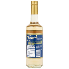 Torani Cheesecake Syrup latte drizzle enhances a creamy coffee drink.