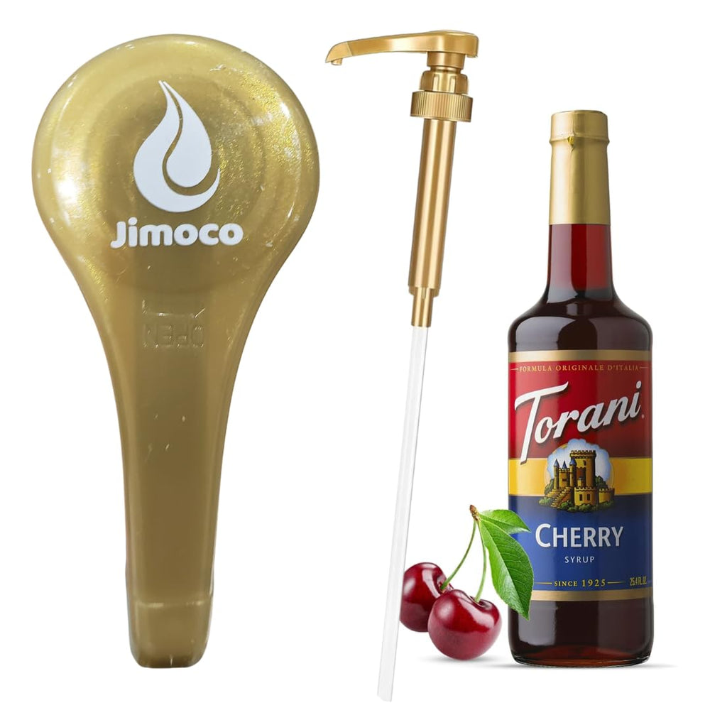 Cherry syrup bottle beside espresso setup for drinks.