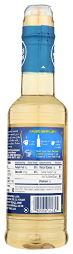 Torani French Vanilla Syrup pouring over coffee for a creamy sugar-free flavor.