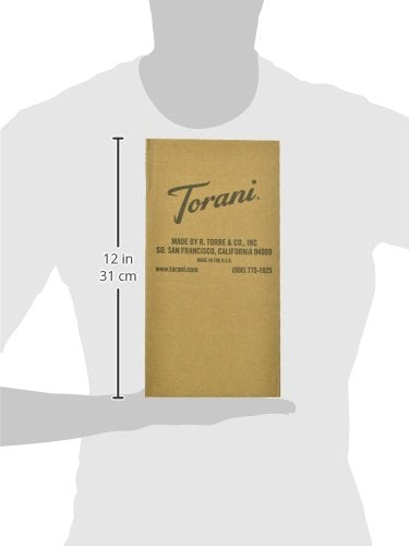 Torani syrup bottle in a stylish kitchen setup ready for crafting drinks.