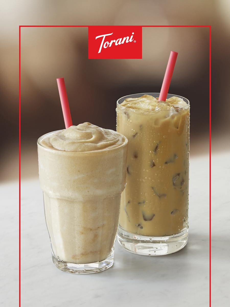 Torani Macadamia Nut Syrup in a coffee cup with drizzle.