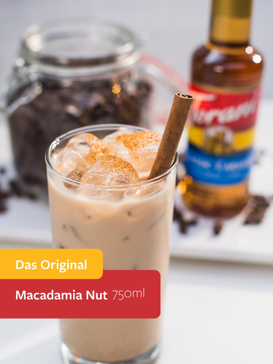 Close-up of Torani Macadamia Nut Syrup label highlights flavor notes.