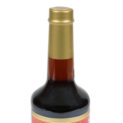 Torani Maple Syrup close-up shows rich amber color and smooth texture