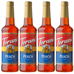 Torani Peach Syrup bottle with peaches for peach-flavored drinks.