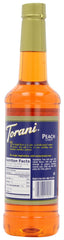 Torani Peach Syrup over ice in a tall glass, perfect for peach iced tea.