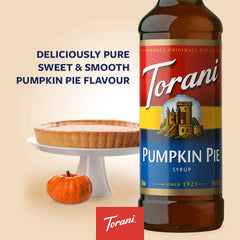Torani Pumpkin Pie Syrup being poured into a latte for cozy vibes.