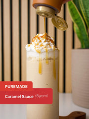 Torani Puremade Caramel Sauce pouring into coffee for a rich twist