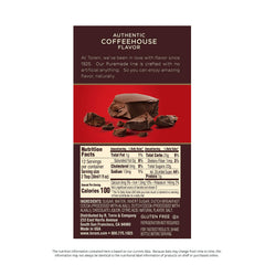 Torani Puremade Dark Chocolate Sauce being poured over a hot mocha.