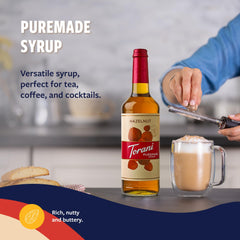 Torani Puremade Hazelnut Syrup being poured over a drink.