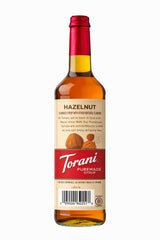 Torani Puremade Hazelnut Syrup pour showing smooth drizzle for lattes