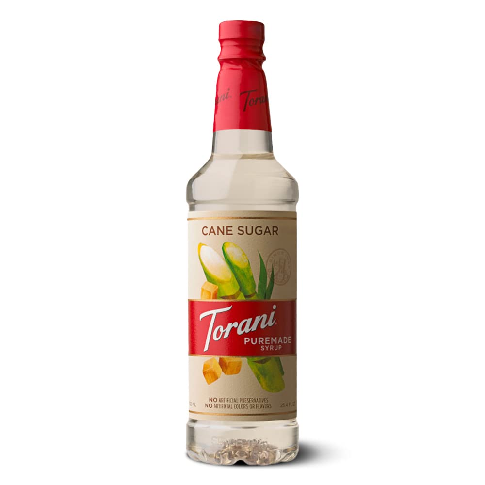 Torani Puremade Cane Sugar syrup bottle for clean, natural sweetening in coffee.