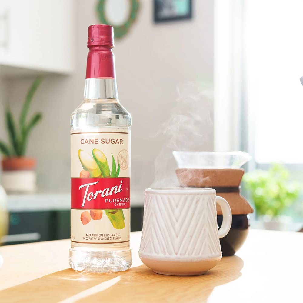 Torani Puremade Cane Sugar syrup coffee station captures authentic cafe sweetness for beverages.