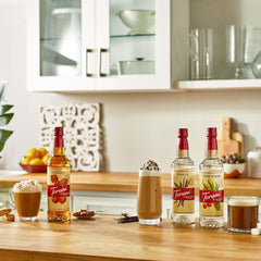 Pour shot of Torani Puremade Vanilla syrup ideal for lattes and beverages