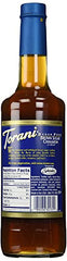 Torani Sugar Free Brown Sugar Cinnamon Syrup being poured into a latte for rich flavor