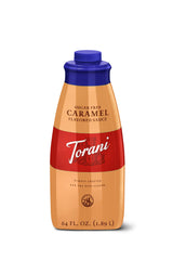 Torani Sugar Free Caramel Sauce bottle on a counter for sugar-free beverages.