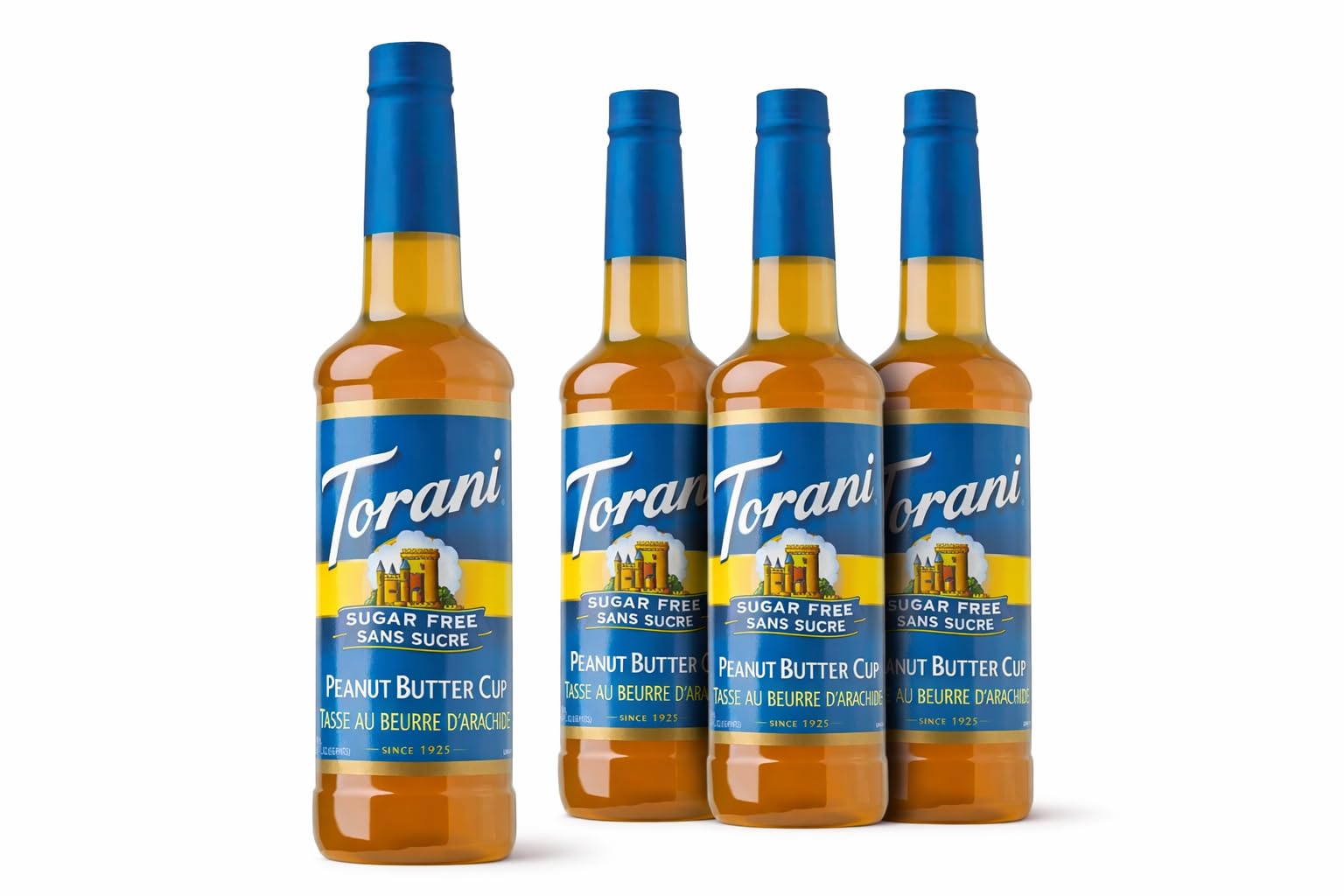 Pouring Torani Sugar-Free Peanut Butter Cup into a coffee latte for depth of flavor.