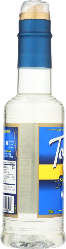 Torani Vanilla Syrup bottle close-up highlighting vanilla aroma for coffee flavor.
