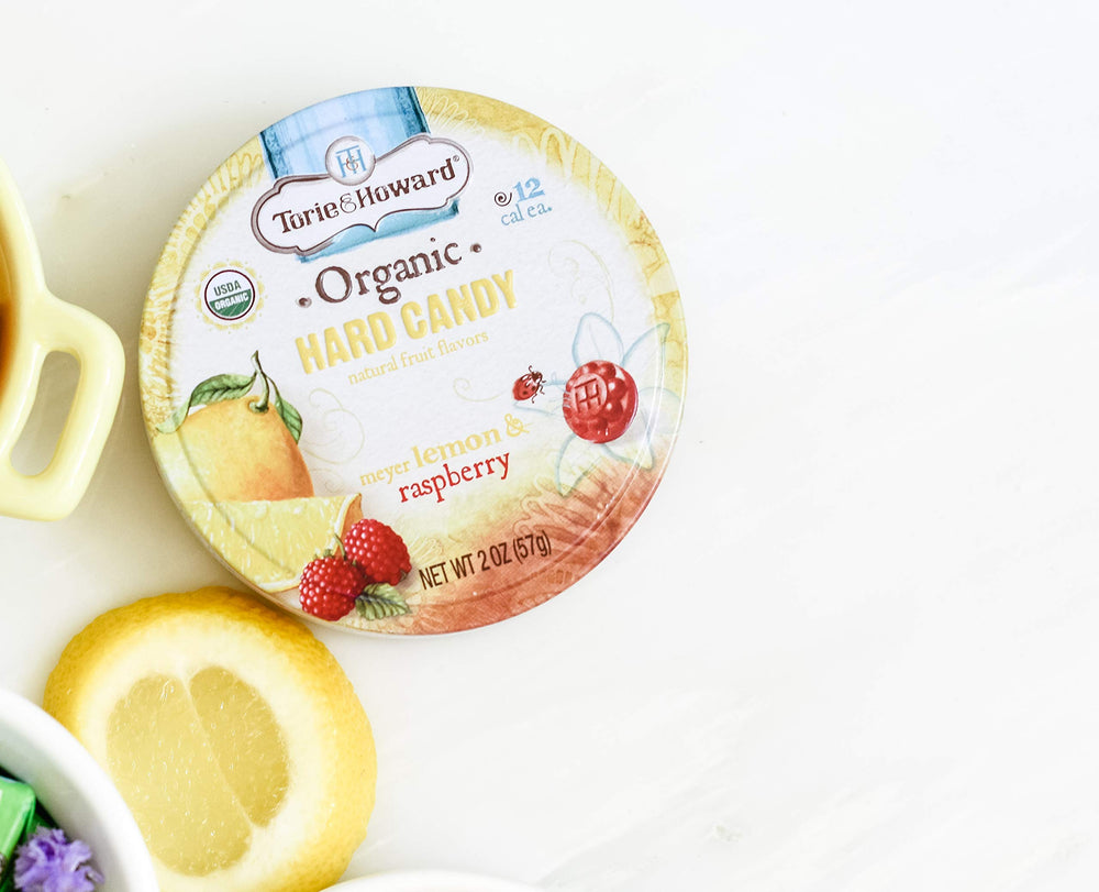 Torie & Howard 2 oz package pictured on a desk for easy snacking.