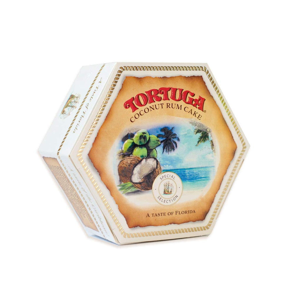 TORTUGA festive table with coconut rum cake centerpiece.