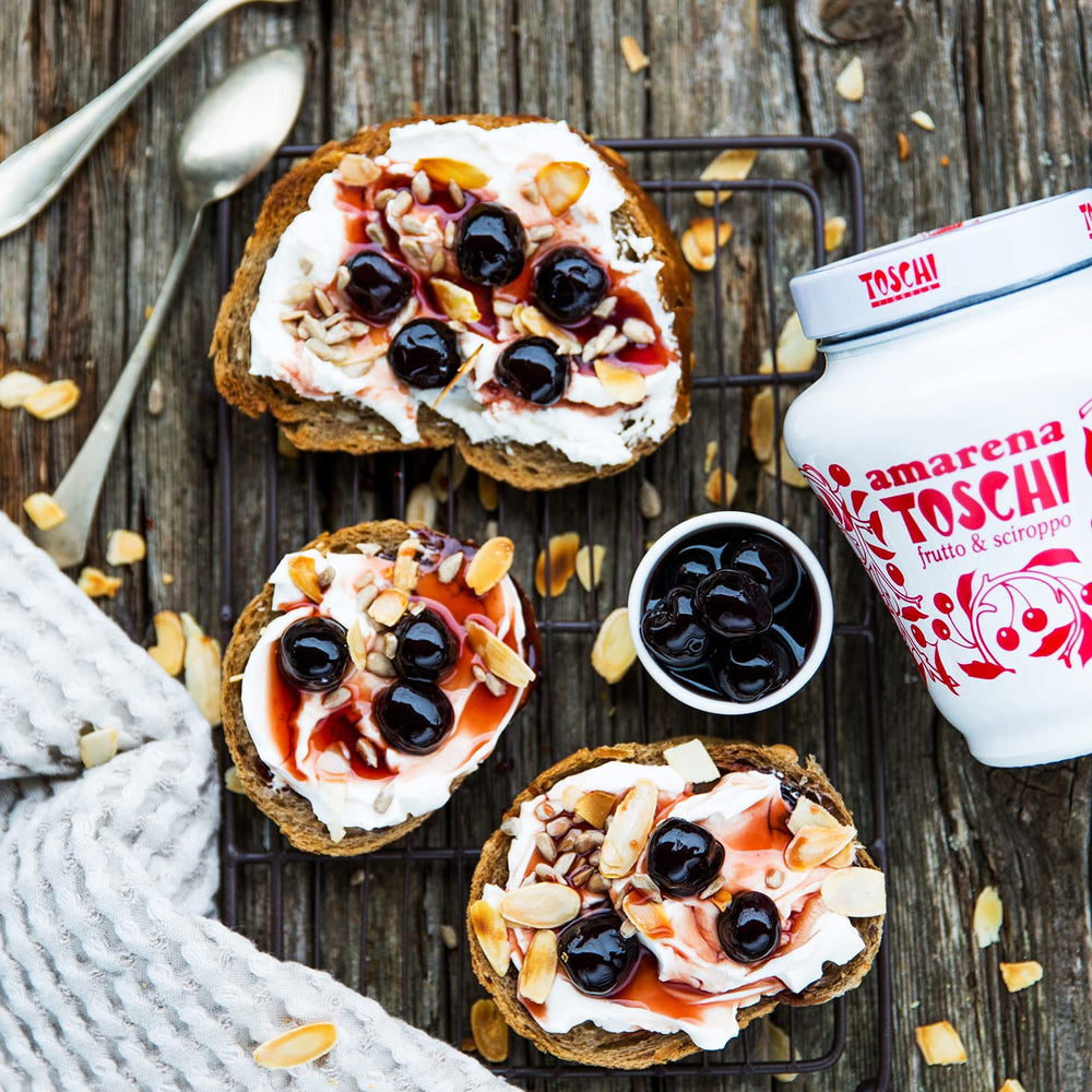 Toschi Amarena Cherries on a cheese board enhance savory pairings