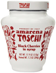 Toschi Amarena cherries in syrup jar ready to garnish desserts