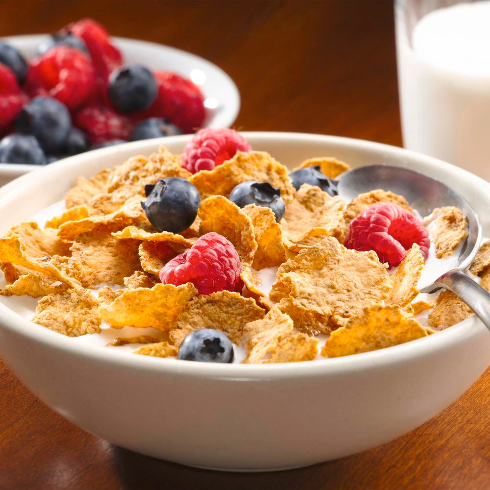 Total Breakfast Cereal milk being poured into a bowl