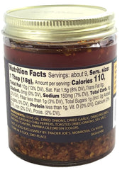 Trader Joe's Chili Onion Crunch close-up shows crispy onion bits and chili seasoning.