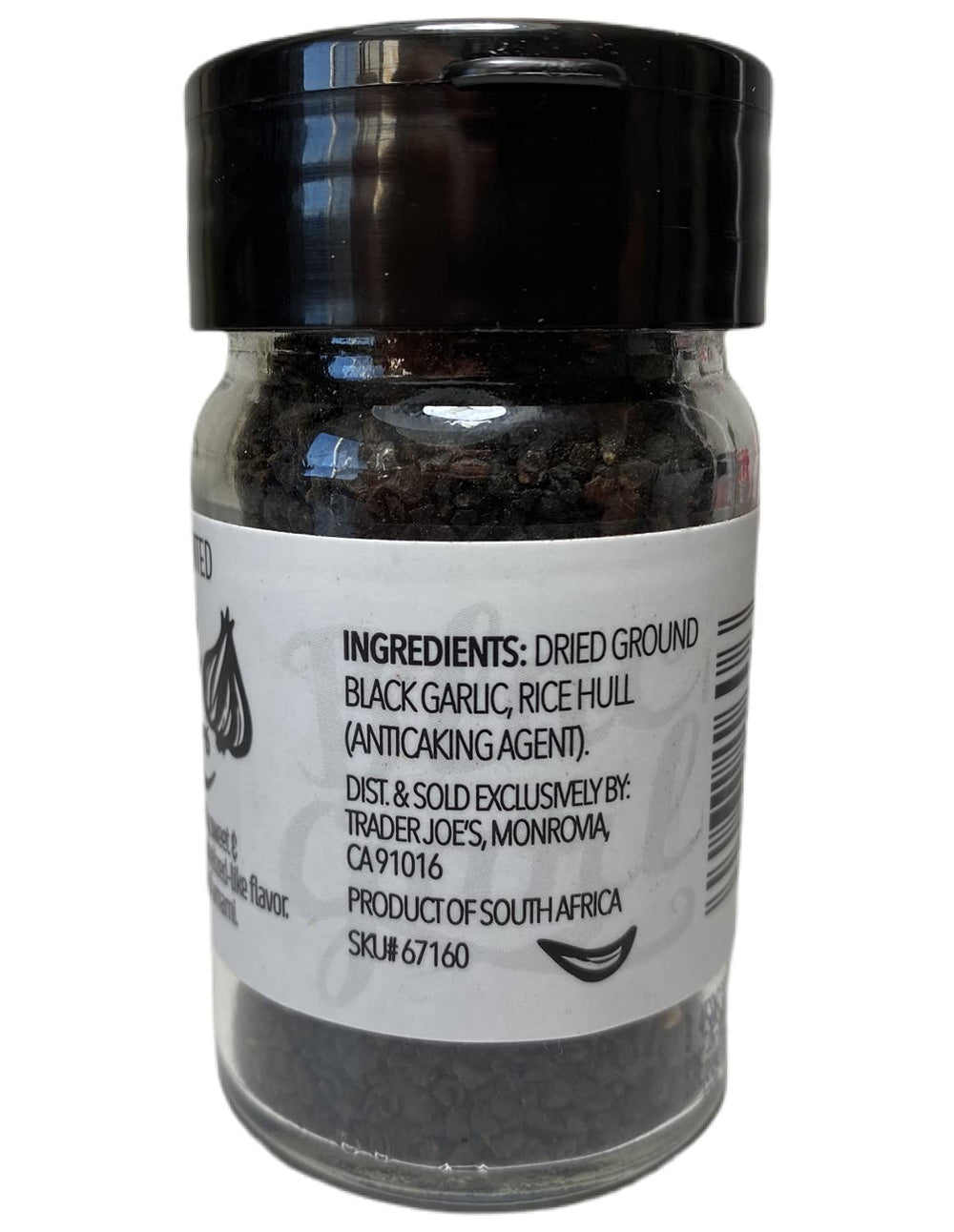 Trader Joe's ground fermented black garlic jar suggesting pantry staple for sauces.