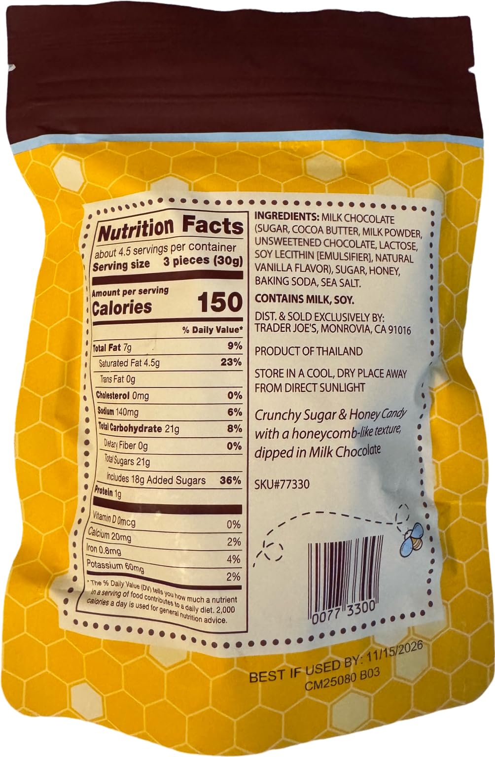Trader Joe's milk chocolate honeycomb candy closeup, highlights crunchy texture and creamy coating.