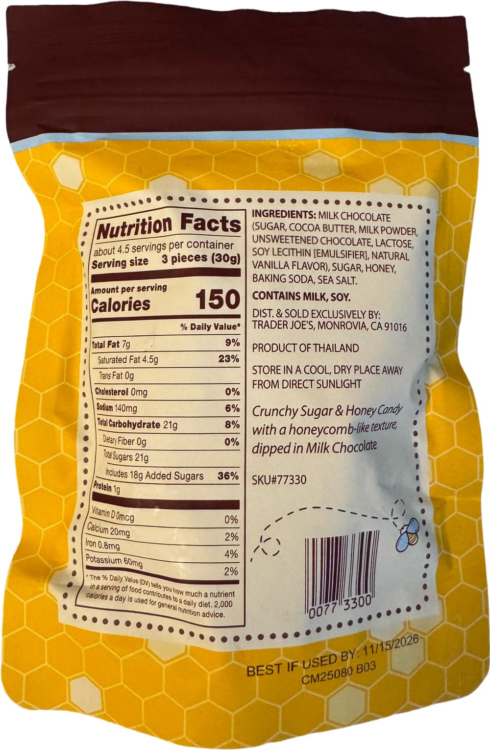 Trader Joe's milk chocolate honeycomb candy closeup, highlights crunchy texture and creamy coating.