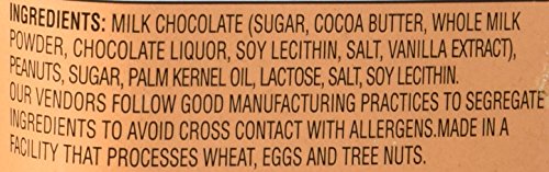 Trader Joe's Milk Chocolate Peanut Butter Cups cross-section reveals creamy center, perfect indulgence.