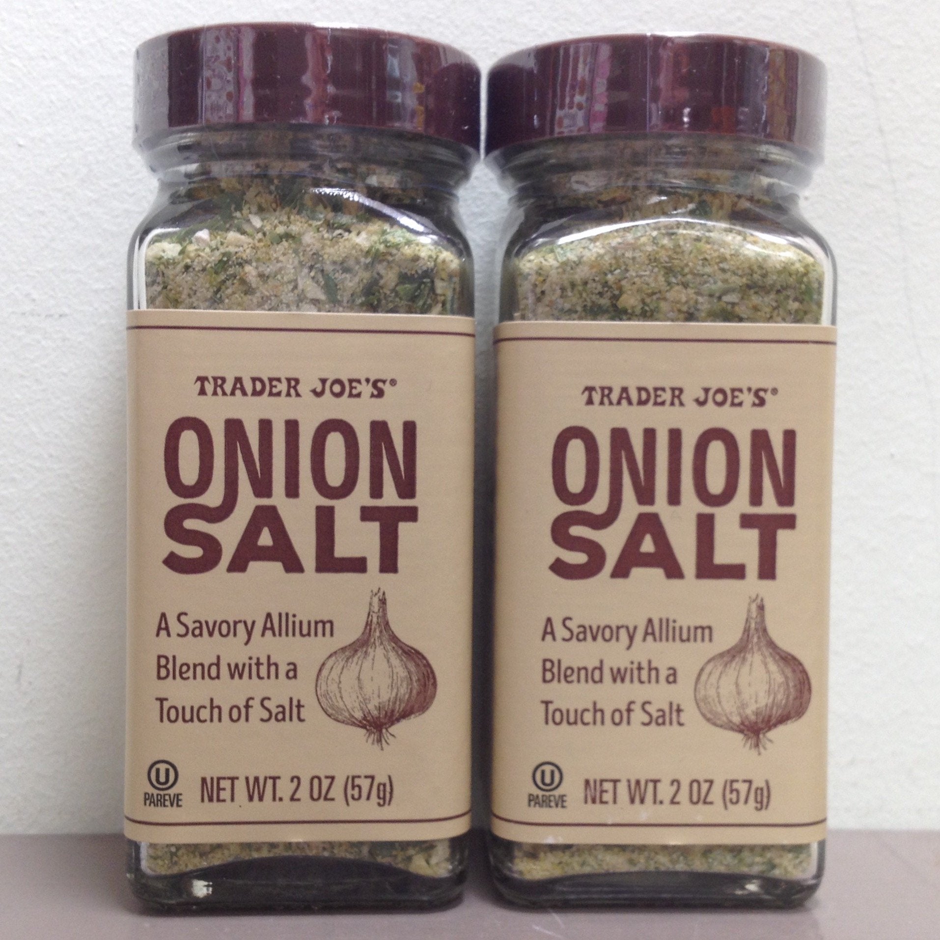 Trader Joe's Onion Salt front-pack display adds savory depth to meals.