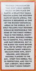 Trader Joe's Organic Blood Orange Rooibos cup shows vibrant infusion for relaxing evenings.