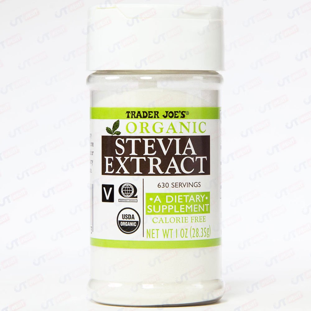 Trader Joe's Organic Stevia Extract bottle on counter, calorie-free sweetness for drinks.