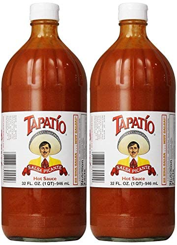 Trader Joe's Tapatio hot sauce two bottles on counter for quick flavor boosts.