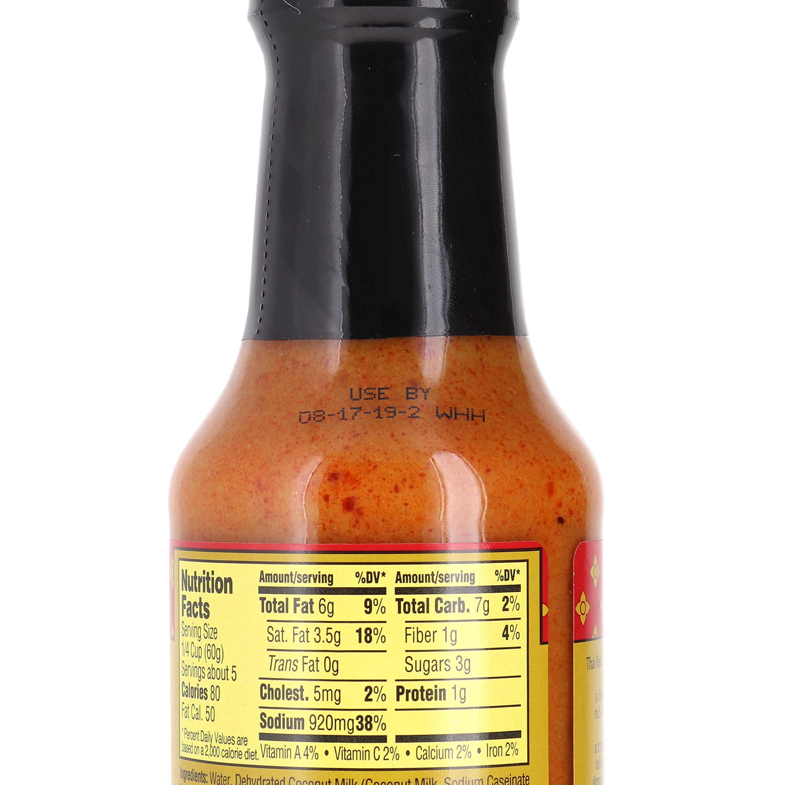 Trader Joe's Thai Red Curry Sauce Bundle—bottle setup highlights convenient two-pack for weeknight dinners.