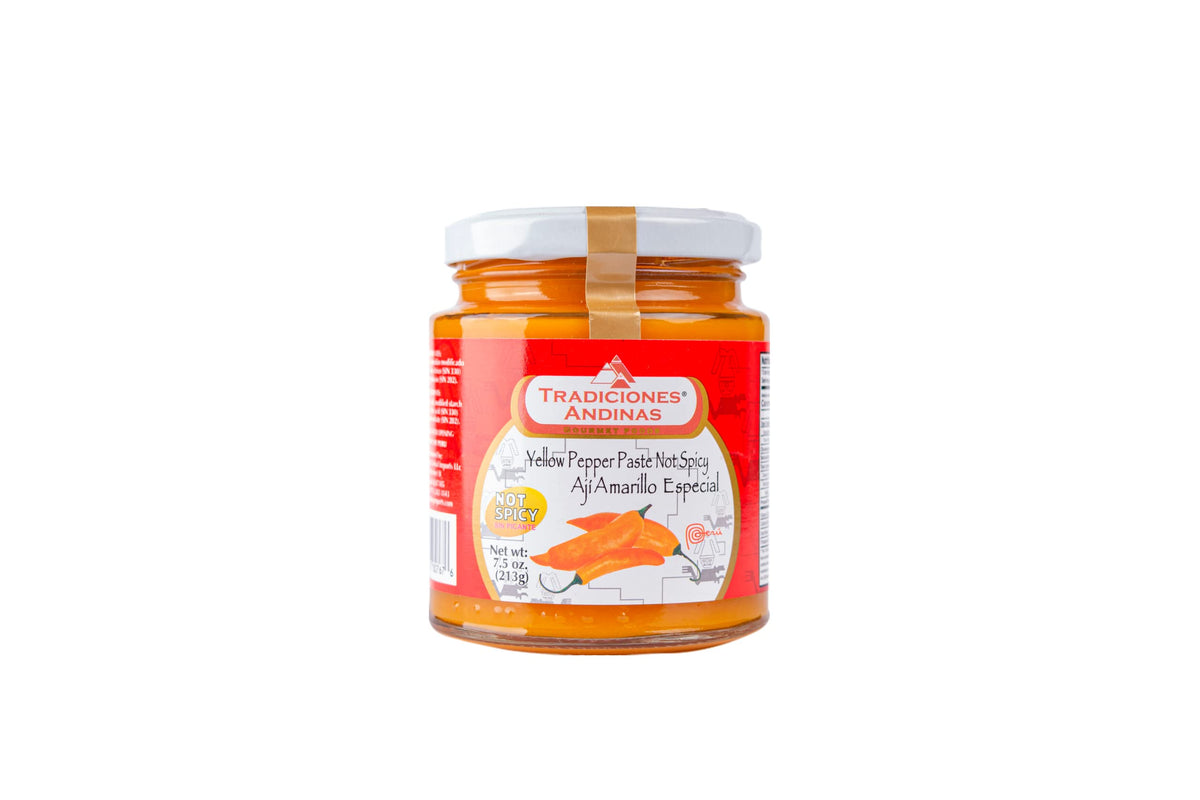 Tradiciones Andinas Aji Amarillo paste in a jar enhances Peruvian dishes with vibrant non-spicy flavor.
