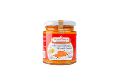Tradiciones Andinas Aji Amarillo paste in a jar enhances Peruvian dishes with vibrant non-spicy flavor.