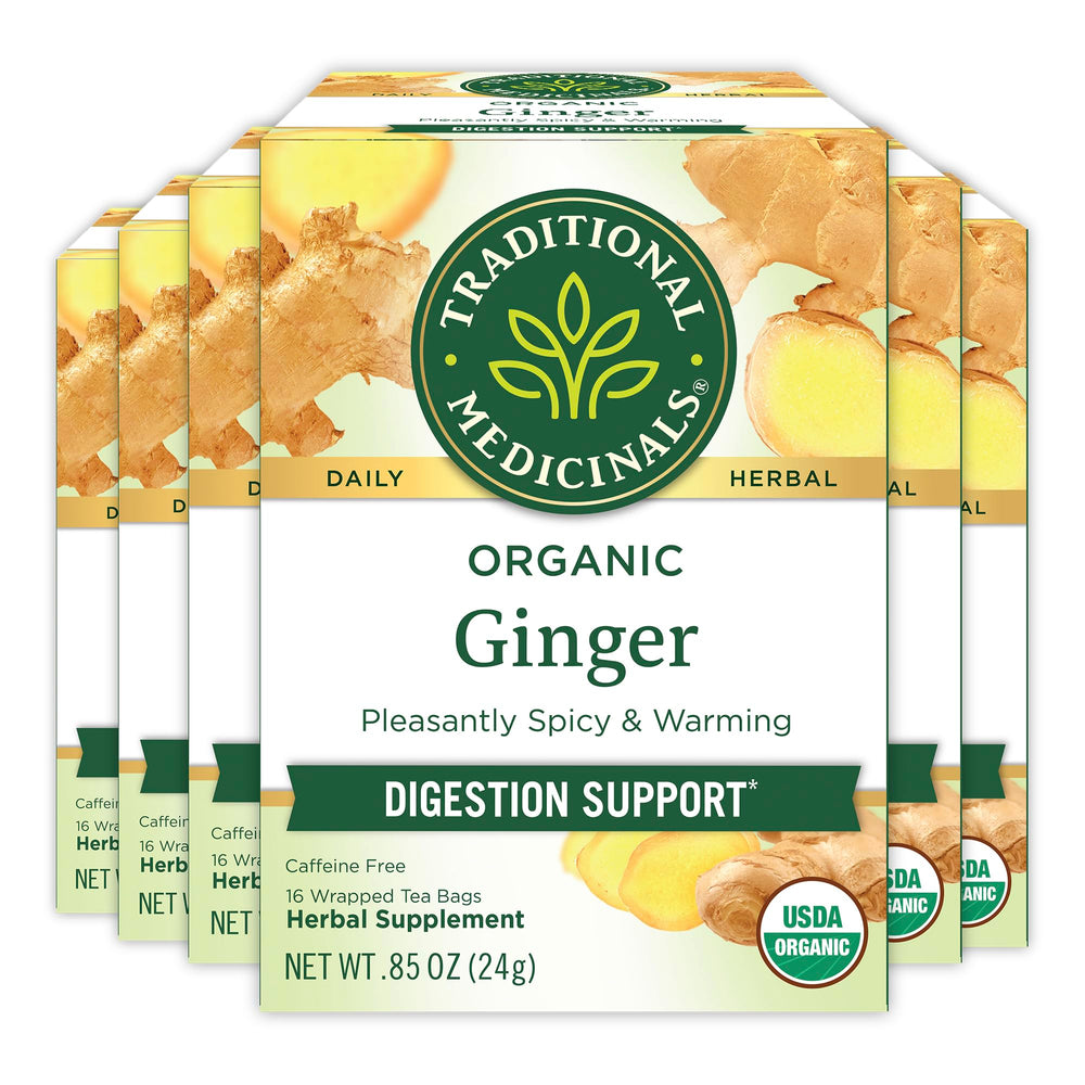 Traditional Medicinals Ginger Tea in a steaming cup promotes digestion and cozy moments.