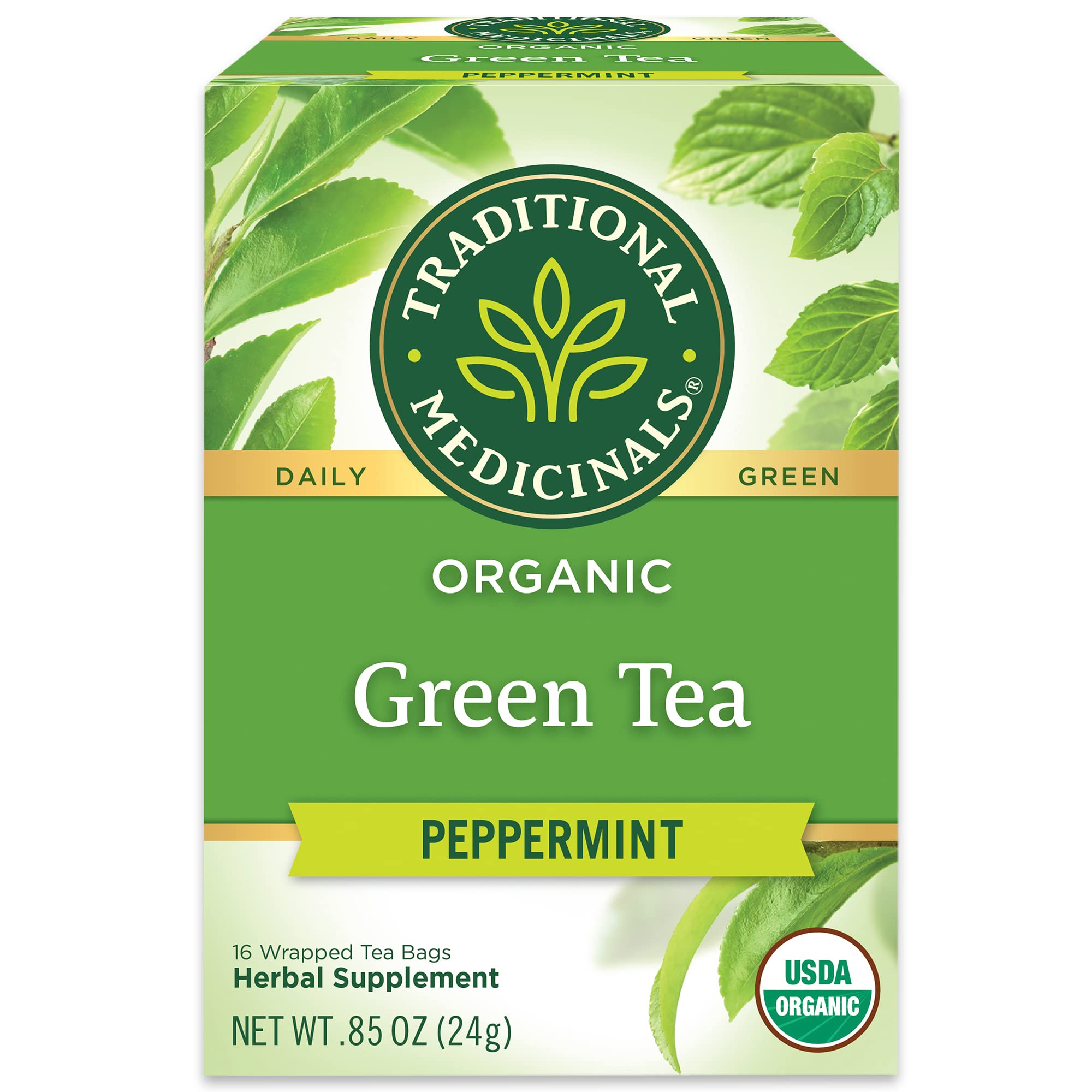 Traditional Medicinals green tea peppermint bag on a saucer, inviting refreshing aroma.