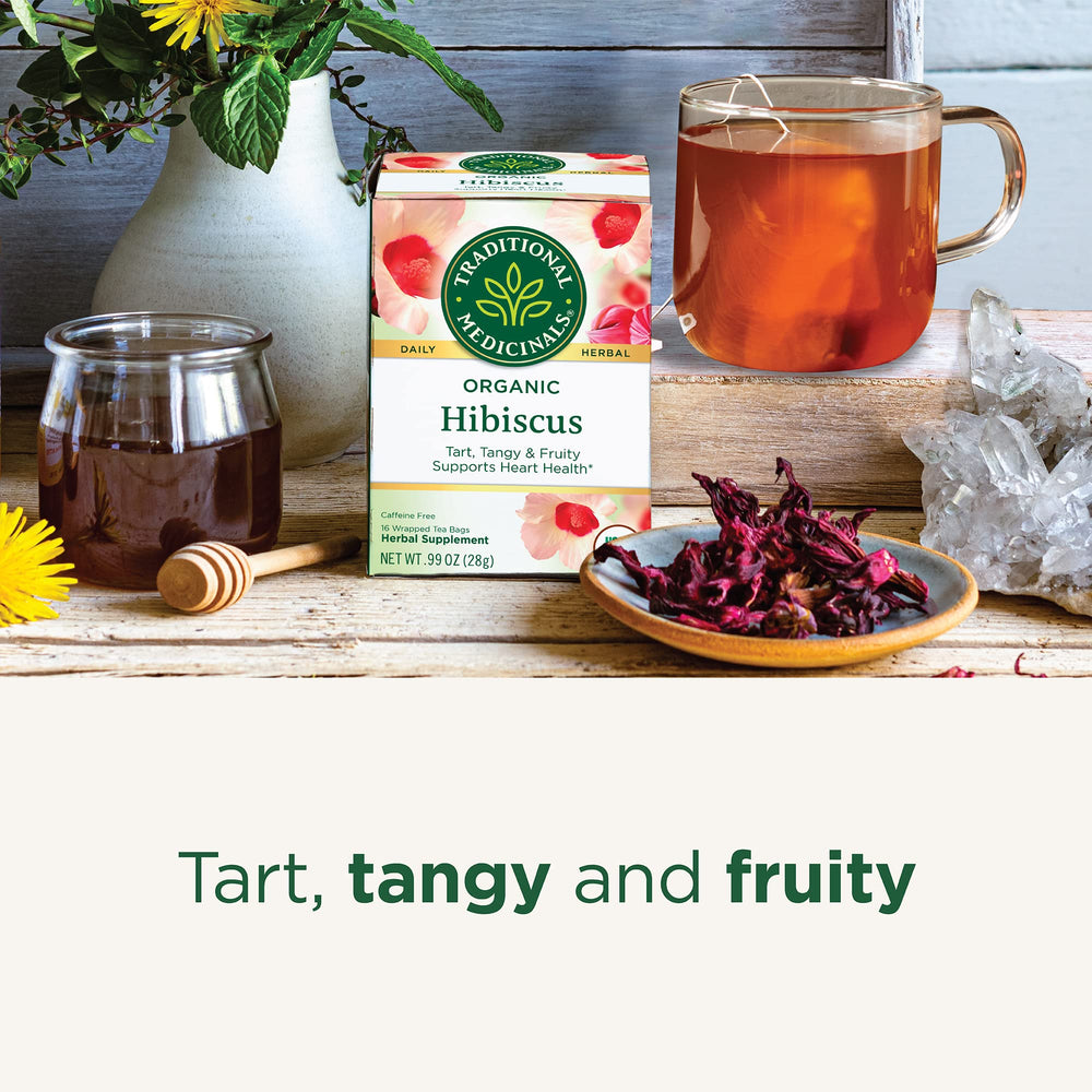 Traditional Medicinals hibiscus tea served iced in a chilled glass with blackberry leaf notes.